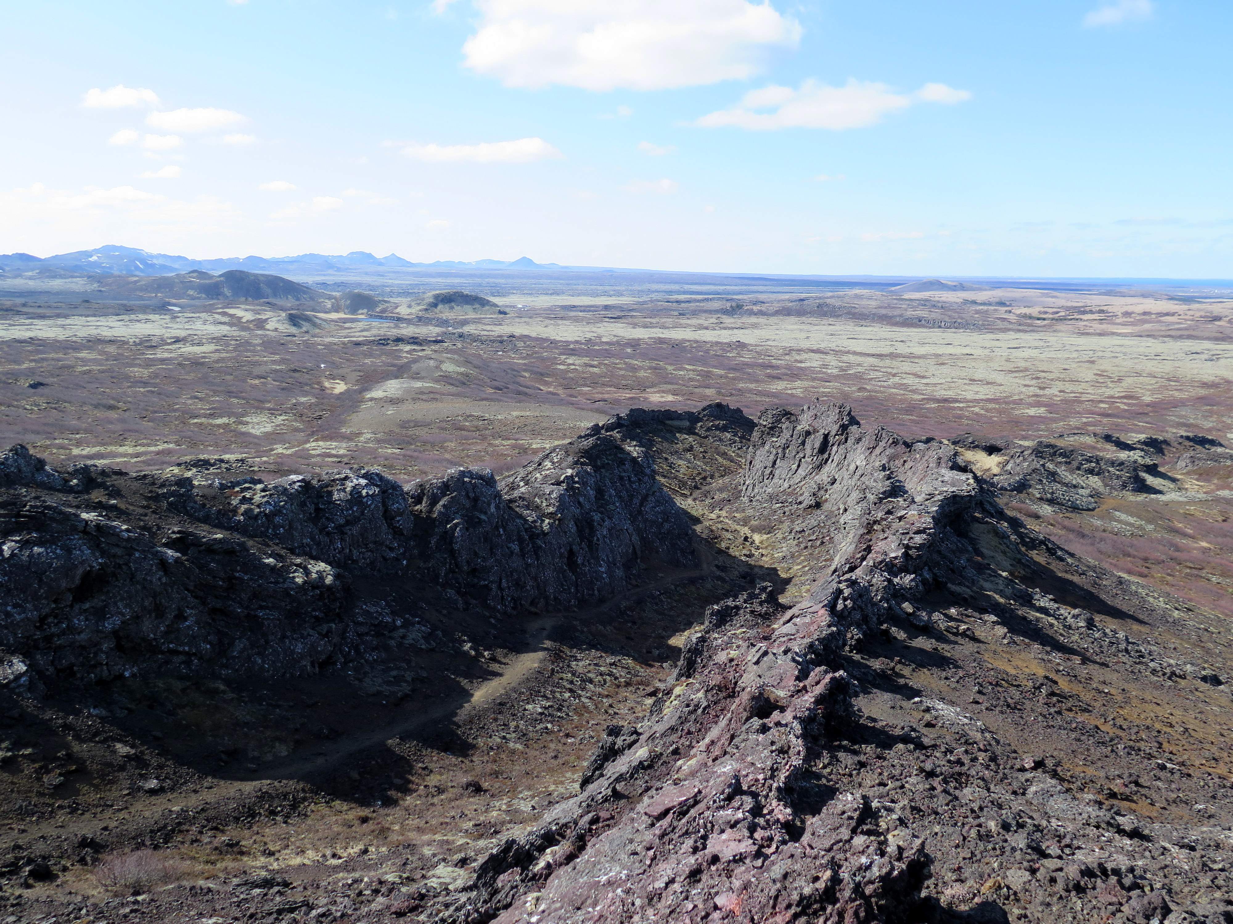 Burfellsgja lava channel and the mountains of Reykjanes in the distance.
