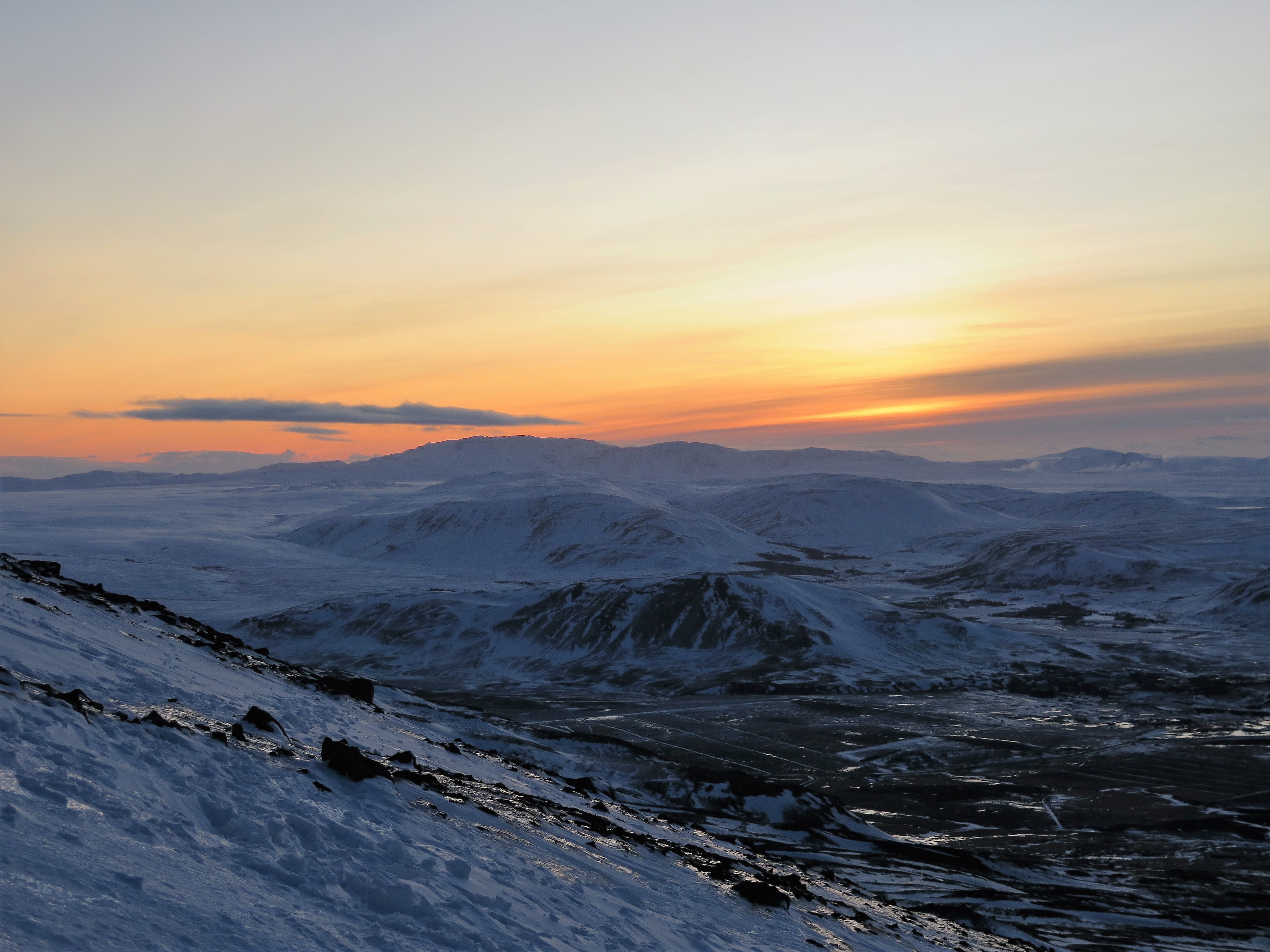 Winter sunrise from the slopes of peak Þverfellshorn of Mt. Esja. 